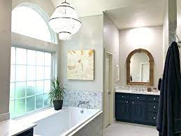 The capiz works beautifully with the light walls and marble tile. Before And After Master Bathroom Remodel Reveal Abbotts At Home