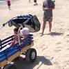 The oversized inflatable wheels are 7 inches wide, which enables the cart to glide effortlessly over sand, mud, gravel and most other terrains. 1