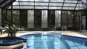 Everyone enjoys socializing in the leaders' spacious (36' x 60') screened enclosure, perfectly safe from mosquitoes. New Pool Enclosures Screenmobile