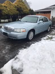 Image result for Light Ice Blue 2005 Town Car