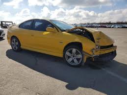 Image result for Yellow 2004 Pontiac
