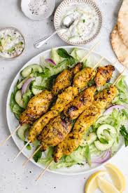 Grilled Chicken Skewers With Indian Marinade And Cucumber Raita Yogurt Sauce In 2020 Grilled Chicken Skewers Cucumber Raita Chicken Skewers