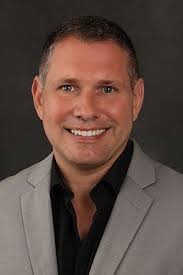 Peering Back at the Glass Century