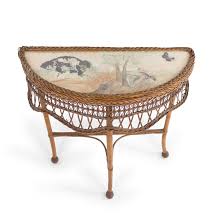 This is a gorgeous half round console table which also includes a smaller one with it. American Victorian Wicker And Glass Console Table