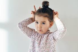 Styling baby hairs has, by no means, just popped out of the woodwork; Close Up Portrait Of Pretty Cute Girls Baby With Hair Gathered O Stock Image Image Of Child Isolated 105168609