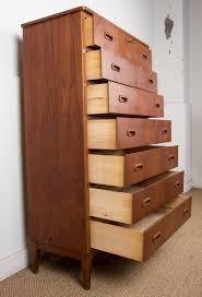 Very clean design features smooth front tambour doors that roll down into the base and out of sight. Large Danish Teak Semainier Chest Of Drawers 1960s 156175