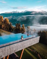 Alpin Panorama Hotel Hubertus Luxury Travel Destinations Travel And Leisure Hotel Swimming Pool