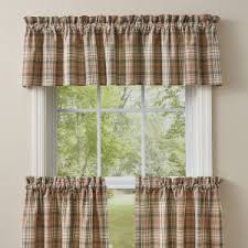 Don't stop at the christmas tree—extend your christmas decorations through the whole living room. Buy Country Curtains Online Swags Valances Drapes More