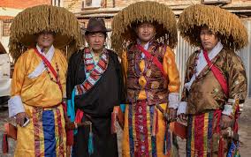 Men with tibetan traditional dress ...