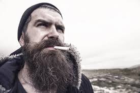 Mann hipster eller mann med skjegg og bart