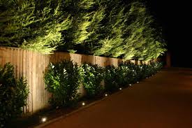 Outdoor solar lights that are designed to be installed on fence posts. Garden Lighting Design Ideas And Tips
