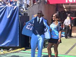 He played college football for the ohio state university and won the heisman trophy in 1995. Turron Davenport On Twitter Eddie George With His Wife Taj Of Swv She Ll Be Singing The National Anthem Today Titans