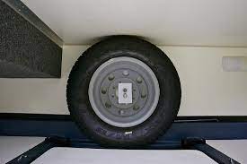 I have come up with a design for a spare tire mount to go on the front bed rail. Good Sam Club Open Roads Forum Spare Tire Wheel
