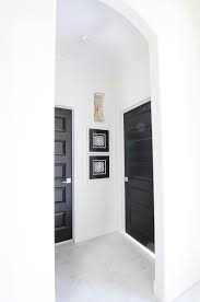 Choose paint recommended for interior doors, such as types with a durable gloss or semi gloss sheen that makes it easy to clean. Homeowners Guide To Black Interior Doors Monica Wants It