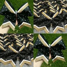 Black And Gold Cheerleading Pom Poms Black And Gold Cheer Bow Black And Gold Softball By Craftyohbows Custom Cheer Bows Cheer Bows Cheer Bow Holder