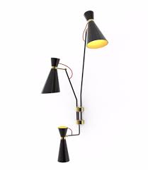Maintain an elevated aesthetic with an industrial style or whimsical orb and globe pieces. Mid Century Modern Wall Lamps To Die For