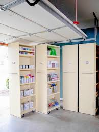 Build a series of wooden shelving units to fit dozens of plastic bins! How To Build Rolling Garage Storage Shelves Easy Garage Storage Garage Storage Shelves Diy Garage Storage