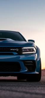 Meanwhile, smoke plumes in the background because cool guys don't look at explosions. Dodge Charger Hellcat Iphone Wallpapers Free Download