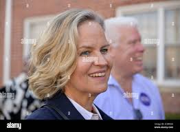 October 30, 2022, Mineola, New York, United States: L-R, MEL STERN, wearing  â€˜NYSUT Political Actionâ€™ vest, and NYS Senator JOHN BROOKS talk before  start of Nassau County Rally with Governor Hochul. (Credit
