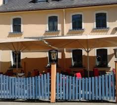 Featured amenities include a business center, multilingual staff, and luggage storage. Aussenansicht Bilder Hotel Erbgericht Buntes Haus Seiffen Holidaycheck
