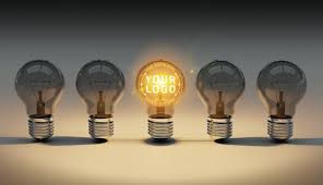 A Logo Mockup Of A Bright Lightbulbs Laying On The Floor Logo Mockup Free Logo Mockup Mockup