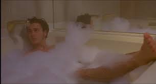 Mike enters the frame in front of a blue sky filled with white clouds. My Own Private Idaho 1991