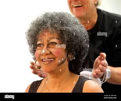 Bochum, Germany. 30th Sep, 2021. Actress Reva Rice is being made up in her  dressing room by the make-up artist for her role as "Mama Locomotive".  After an 18-month pandemic break, the