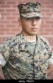 U.S. Marine Corps Recruit Luis D. Lara, a recruit with Golf Company, 2nd  Recruit Training Battalion, crosses a bridge during the bayonet assault  course (BAC) at Marine Corps Recruit Depot, San Diego,