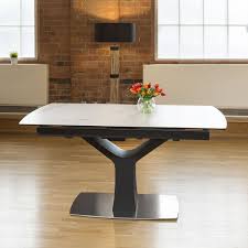 This design is crafted from solid and engineered wood, striking a modern appearance with its circular tabletop perched on a tapered pedestal base. Huge Modern White Ceramic Dining Table Rectangle Extends 1 6 2 1m Ebay