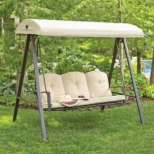 Marquette glider porch swing with stand. Hampton Bay Cunningham 3 Person Metal Outdoor Patio Swing With Canopy Gss00132d The Home Depot Outdoor Patio Swing Patio Swing Canopy Outdoor Swing With Canopy