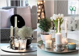 Scatter tealights in glass candle holders on table surfaces to create multiple points of light without overwhelming other decor elements. 10 Awesome Coffee Table Centerpiece Ideas Coffee Table Centerpieces Coffee Table Decor Tray Decorating Coffee Tables