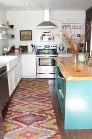 My kitchen is very tiny. 15 Gorgeous White Kitchens With Coloured Islands The Happy Housie