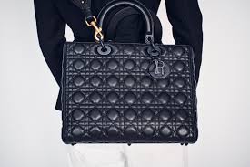 Dior's vision of elegance and beauty. Large Lady Dior Bag Black Ultramatte Cannage Calfskin Bags Woman Dior