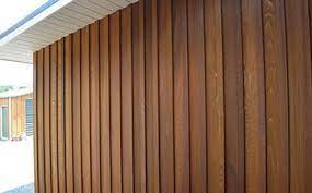 Azek cladding delivers the full aesthetic experience of wood without the laborious, costly, and constant upkeep required with traditional lumber. Stained Cedar Board Amp Batten Cladding House Cladding Cedar Cladding Cladding