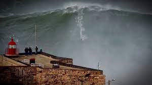 Before it became a tourist destination, the town relied mostly on fishing. 100ft World Record Wave Garrett Mcnamara Surfing Nazare Portugal Youtube