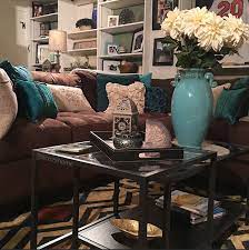 This post was most recently updated on september 23rd, 2019here's a little peek at another room i've been working on lately, my living room. 14 Dark Brown With Aqua Accents Ideas Brown Living Room Brown Living Room Decor Living Room Colors