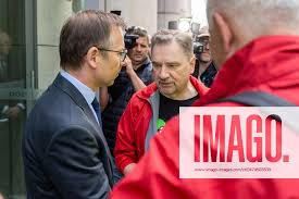 May 10, 2024, Warsaw, Poland: Piotr Duda (Solidarnosc leader) talks to the  representative of the
