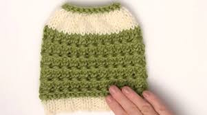 This tutorial for our messy bun hat (also known as the mom bun hat or the ponytail hat) is quite possibly the simplest version out there. How To Knit A Messy Bun Hat Pattern Studio Knit