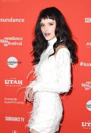 She accentuated her new hair colouring with metallic purple lipstick. Bella Thorne With Black Hair And Baby Bangs Bella Thorne Has Tried Many Hair Colors Over The Years But This One Is Her Natural Hue Popsugar Beauty Photo 13