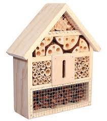 Fix the bug box firmly to the tree trunk or post. How To Design A Bug Hotel To Attract Beneficial Insects Bees