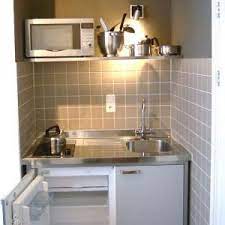 With proper design, small kitchens can function just as well as large ones and can feel even more special, infused with unique kitchen decor that reflects the personality of its owner. Guest Bedroom Basement Kitchenette Perfect For Small Spaces By Nanette Small Basement Kitchen Basement Kitchenette Tiny Kitchen