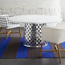 Gather 'round a traditional rectangular dining table or a more sculptural, circular table. Como Round Marble Top Dining Table Crate Love The Mixed Chairs Marble Top Dining Table Dining Table Outdoor Dining Chairs