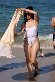 Their miami beach outing came during his day off from performing; Camila Cabello Wears A White Swimsuit During A Pda Filled Beach Day With Shawn Mendes In Miami Florida 290719 24
