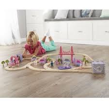 The 75 Piece Fairy Town Train Set A Wooden Train Set That Encompasses A Town Populated By Fairies Wooden Train Set Wooden Train Train Set