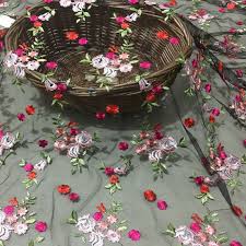 Find the perfect floral embroidery stock photo. Embroidered Floral Lace Fabric Netting Cloth With Multi Colored Flower Pattern