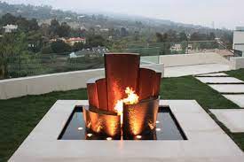 It features a round bowl made out of glass fiber reinforced concrete and has a sandstone finish. Unique Water Fountains Contemporary Water Feature Outdoor Water Features Water Fountain