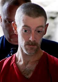 Hearing for escaped inmate suspected in killing while