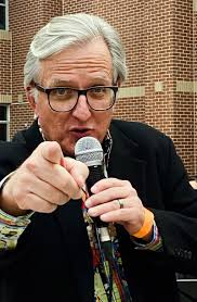 Raising money at a charity auction is more than talking fast.