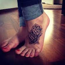Blue rose tattoo on foot. 10 Foot Rose Tattoos