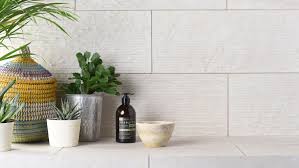 But with so many styles around, it can be hard to choose here, classic white metro tiles have been laid in a herringbone design, which works well with the monochrome patterned tiles over the bath. How To Choose Bathroom Tiles Find The Best Ones To Suit Your Bathroom Space Real Homes